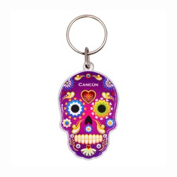 Llavero de acrílico en forma de calavera, típico de la tradición del día de muertos en México. Souvenir de Cancún, México