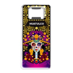 Destapador de metal con una catrina. Souvenir de Huatulco, México.