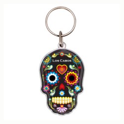 Llavero de acrílico en forma de calavera, típico de la tradición del día de muertos en México. Souvenir de Los Cabos, México