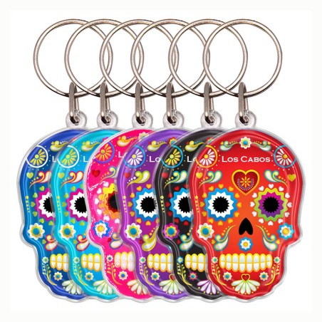 Llavero de acrílico en forma de calavera, típico de la tradición del día de muertos en México. Souvenir de Los Cabos, México