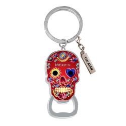 Llavero destapador de metal en forma de calavera. Souvenir de la península de Yucatán, México.