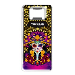 Destapador de metal con una catrina. Souvenir de la península de Yucatán, México.