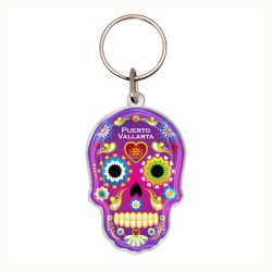 Llavero de acrílico en forma de calavera, típico de la tradición del día de muertos en México. Souvenir de Puerto Vallarta, Méxi